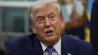 US President Donald Trump speaks as he signs an executive order on artificial intelligence in the Oval Office of the White House in Washington, DC, US, on December 11, 2025.